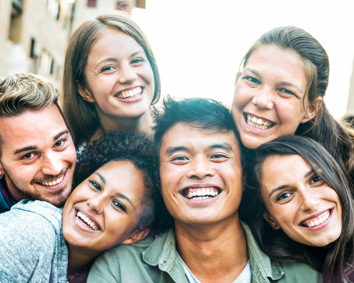 Different people smiling for a photo