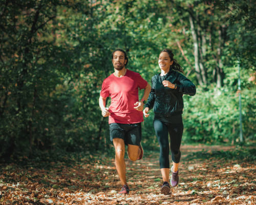 Couple running on a trail