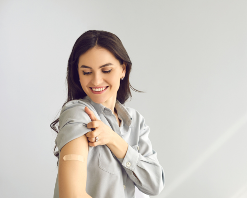 woman with bandaid on her arm