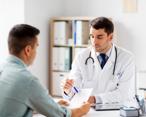 Doctor speaking with man